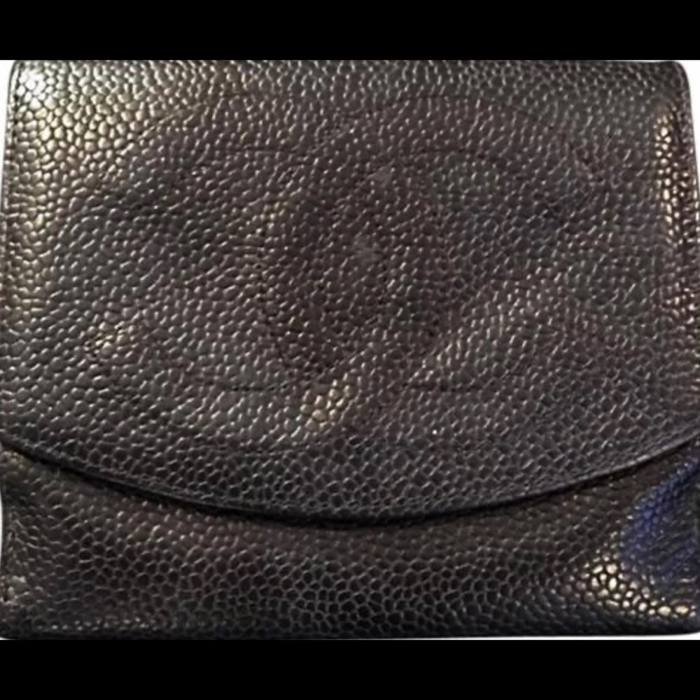Authentic Chanel wallet. Card compartments and back coin pouch with closure.